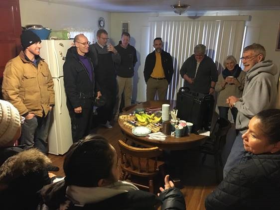 residents gather in kitchen 