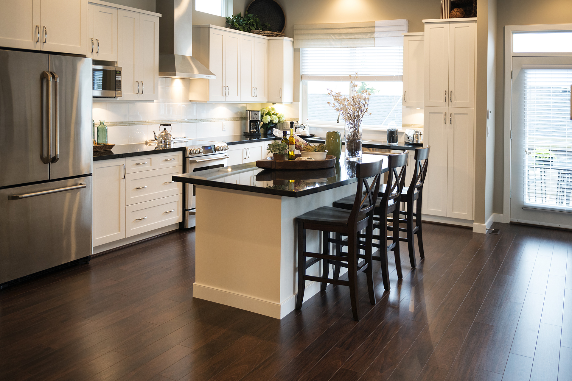 A kitchen interior with an induction stovetop