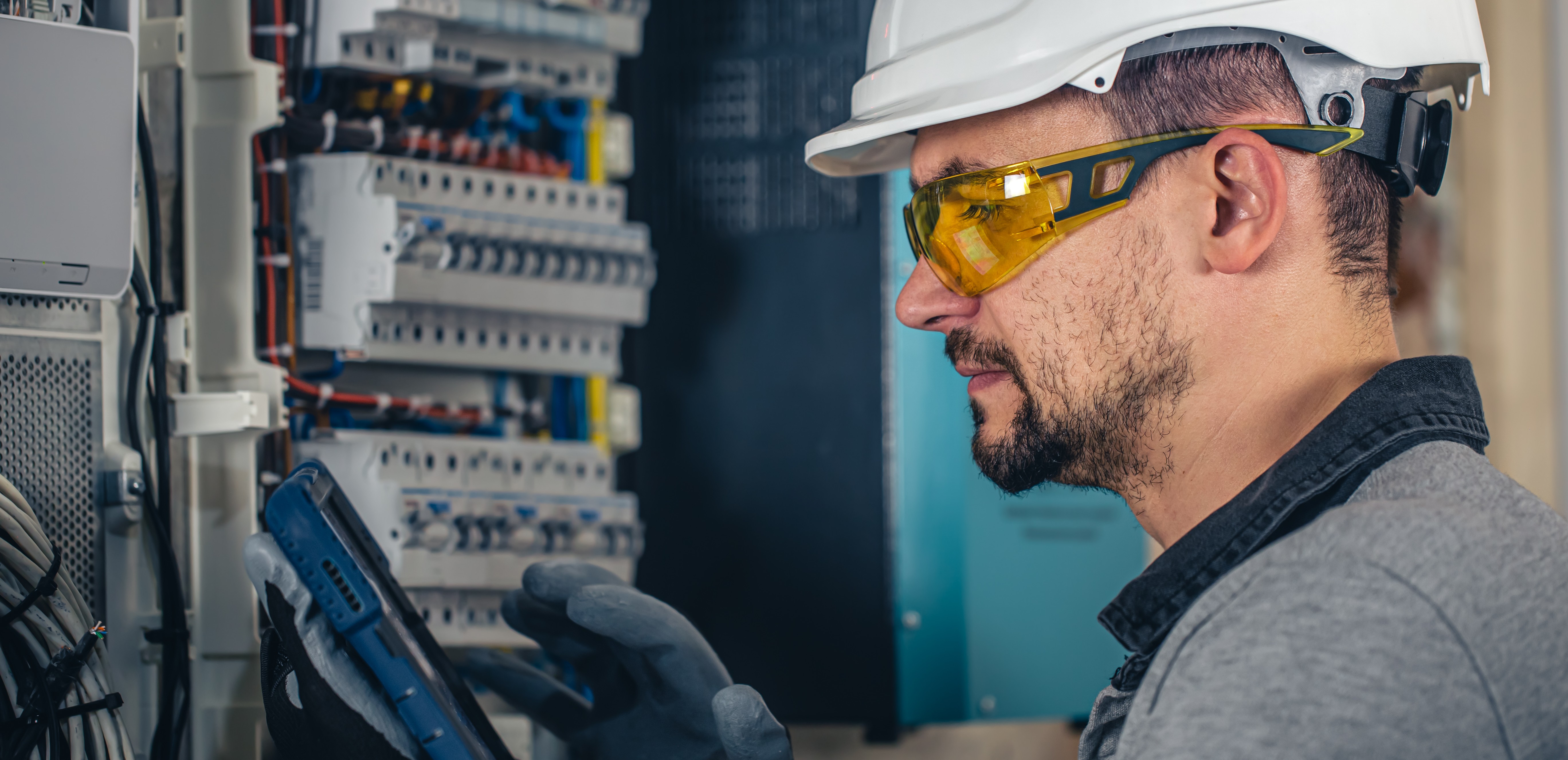 electrician performing maintenance