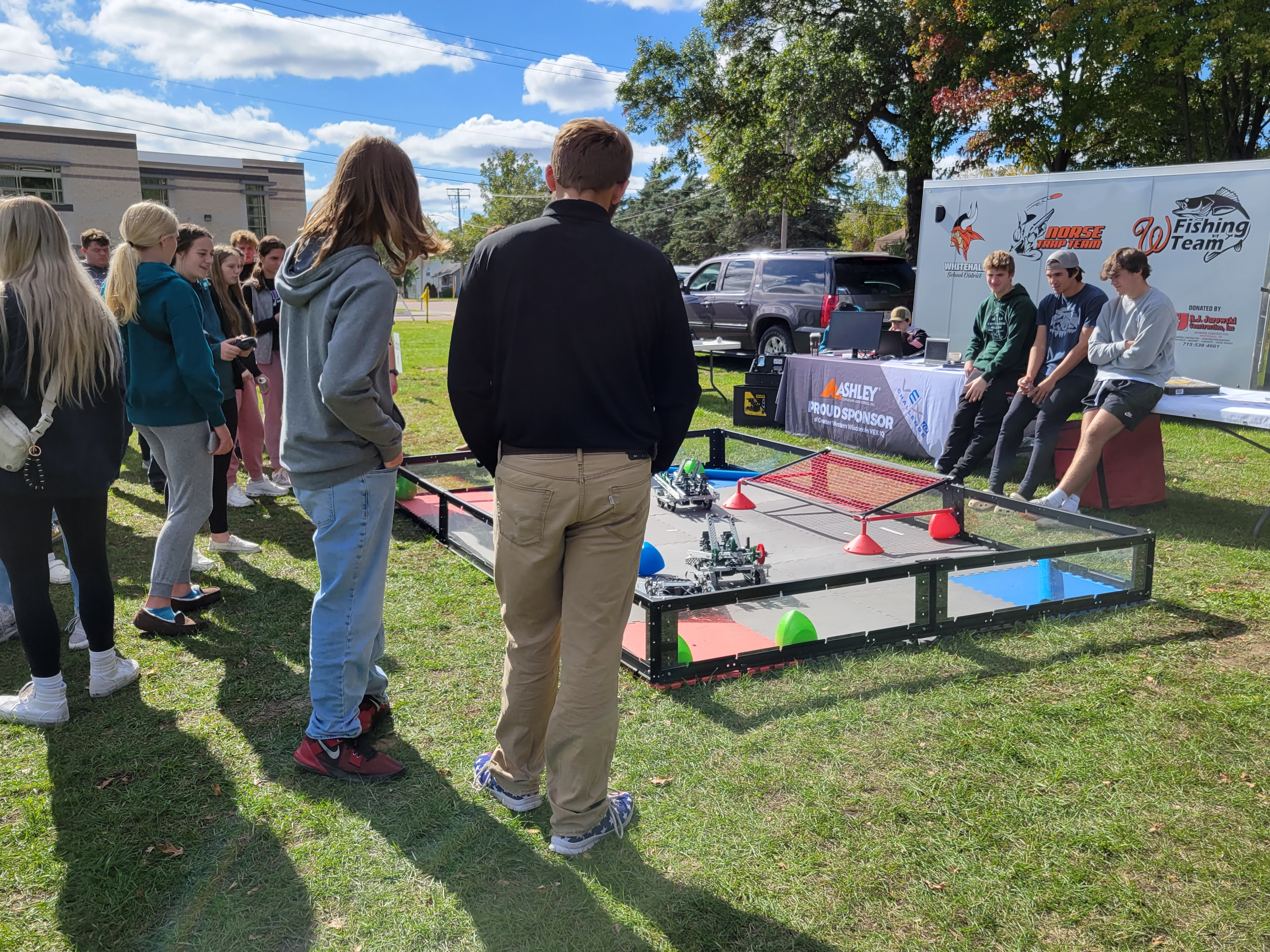 Students testing robotics under the supervision of Whitehall Robotics