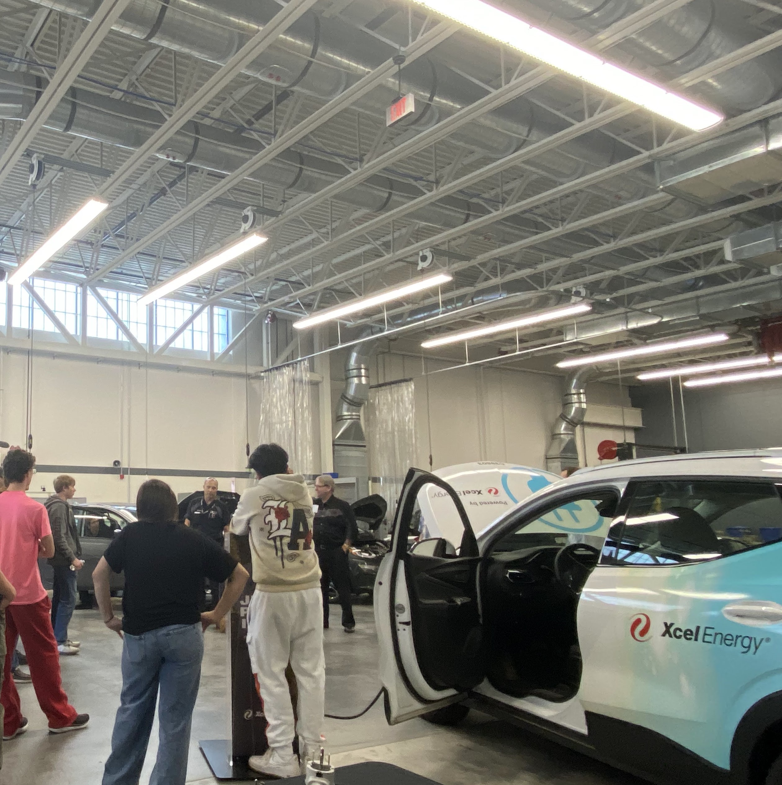 Electric vehicles in a warehouse provided by Xcel Energy