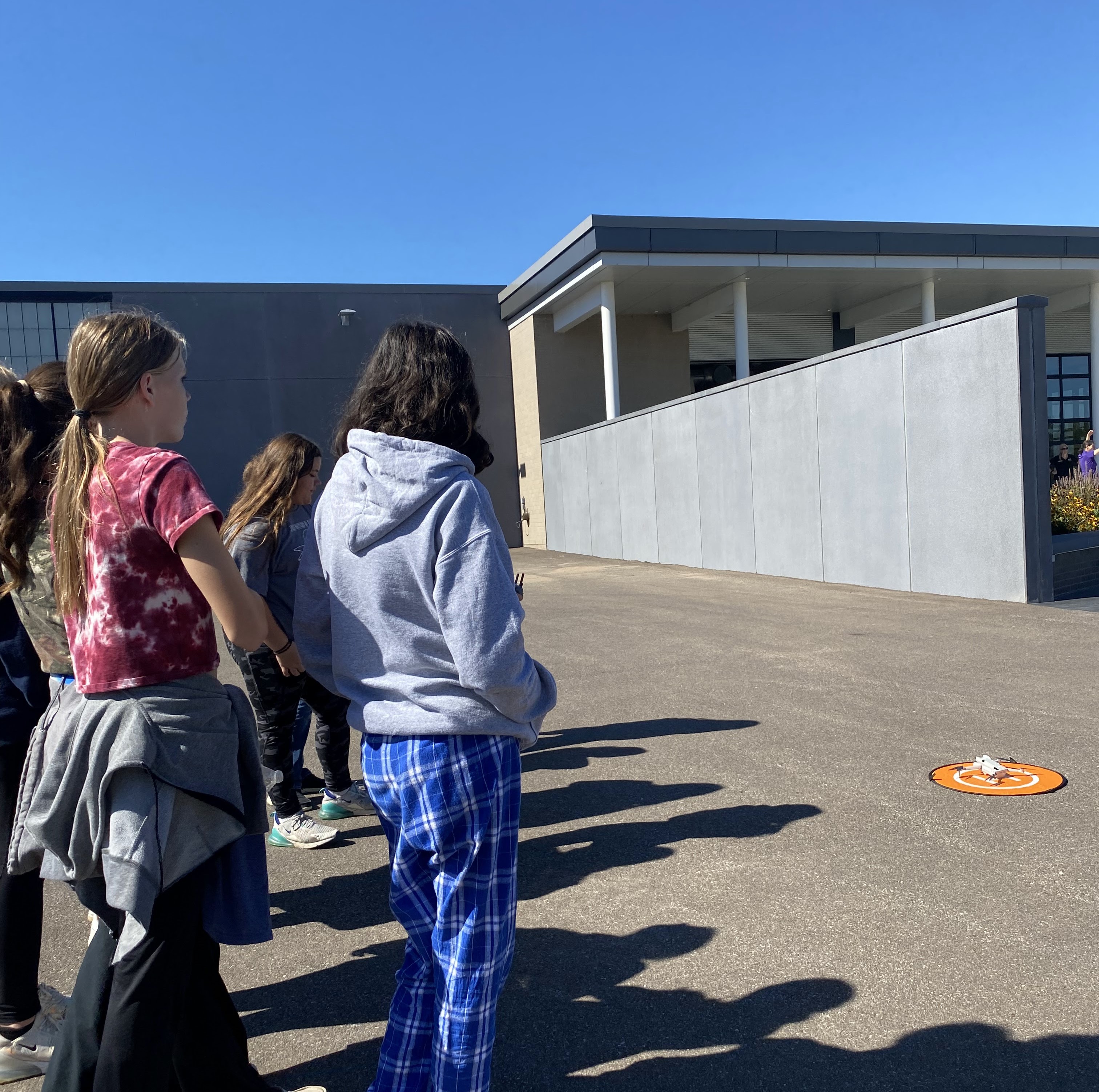 Students about to fly drones in the drone workshop