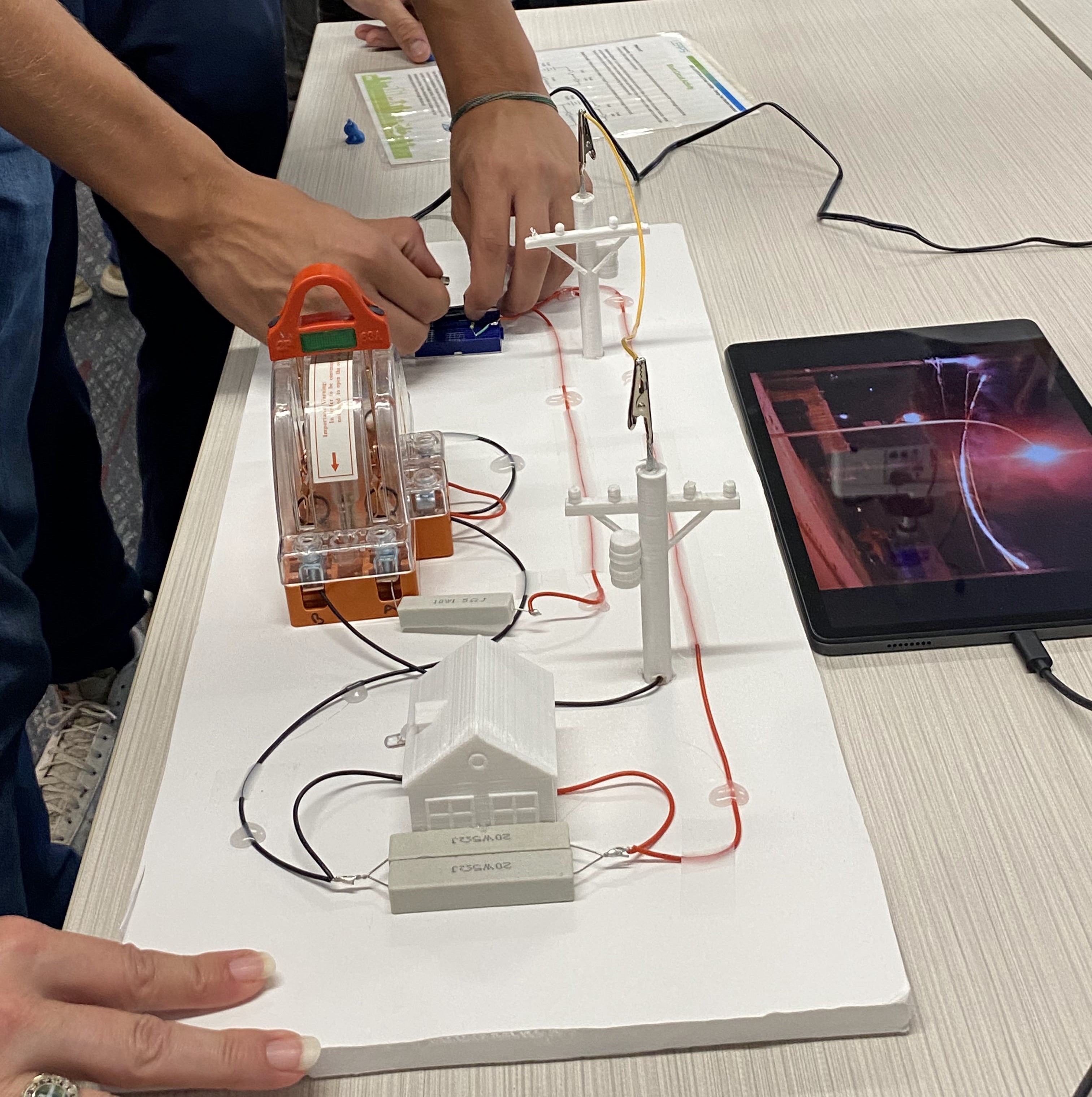 Students testing out circuit boards