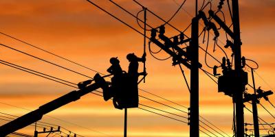 utility workers and power lines