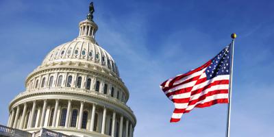 American flag waving at the capitol
